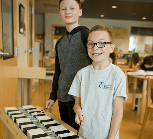 Two students practice music