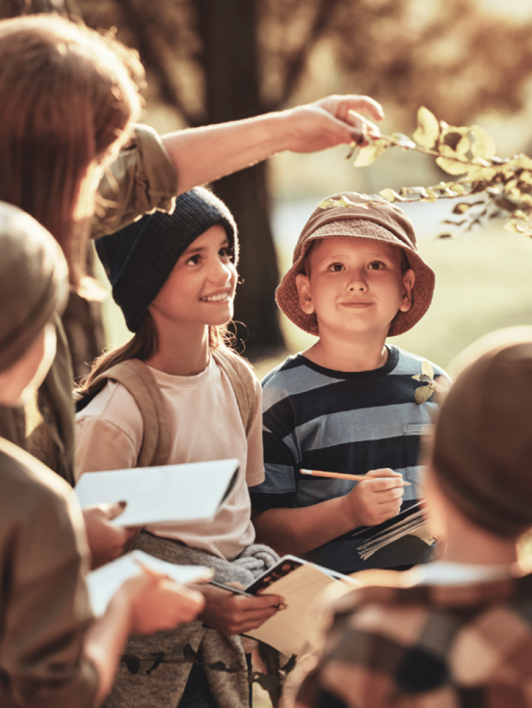 Children learning about nature, in nature.