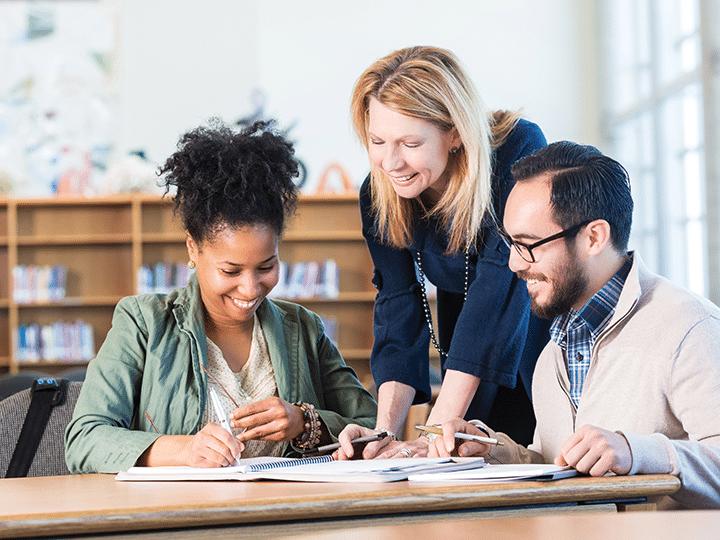 Parents review financial documents, excited for their children's future growth and happiness